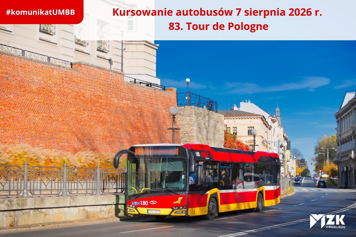 Zdjęcie autobusu na tle centrum miasta.